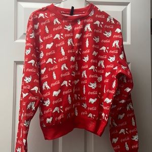NWT Coca-Cola polar bear sweatshirt. Super cute and cozy. Slightly cropped.